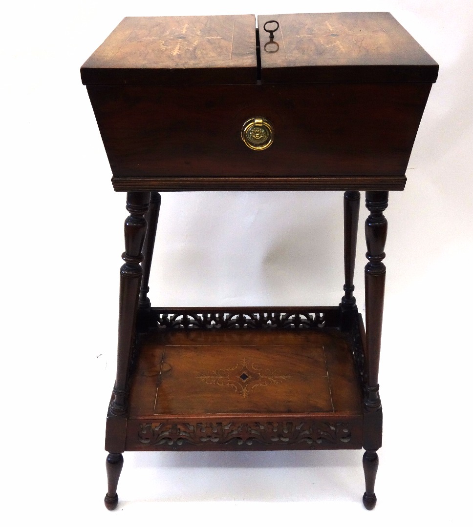 Appraisal: A Victorian walnut needlework cabinet boxwood and ebony strung and