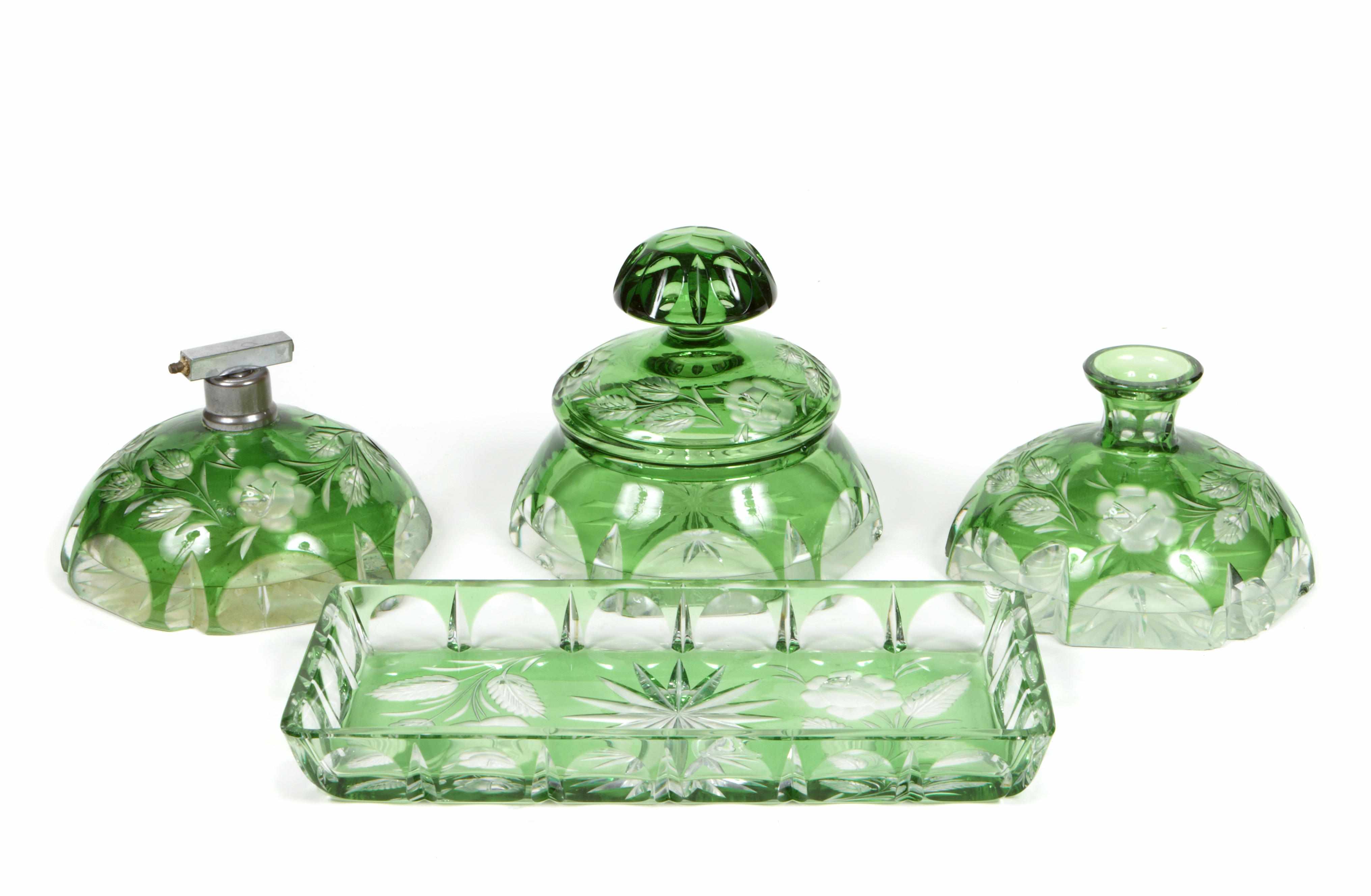 Appraisal: An assembled group of green cut glass table articles Comprising