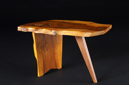 Appraisal: GEORGE NAKASHIMA Cherry coffee table with free-edge top and slender