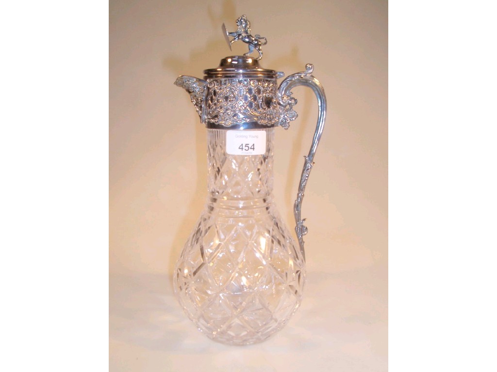 Appraisal: A cut glass and silver plated claret jug the baluster