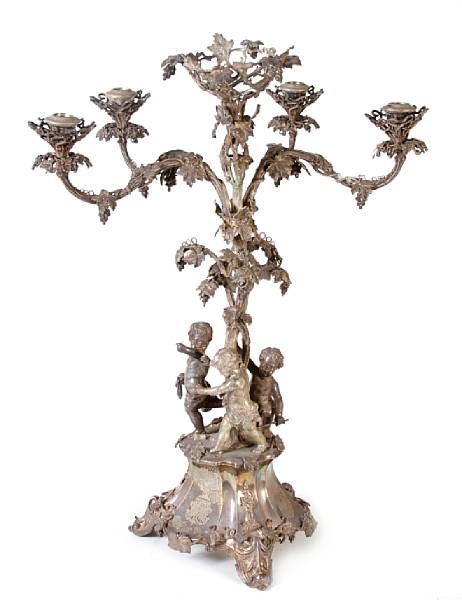 Appraisal: A large plated figural six light candelabra epergne Cast with