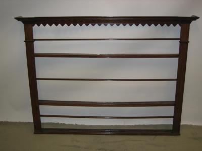 Appraisal: AN OAK DELFT RACK the moulded cornice and waved frieze