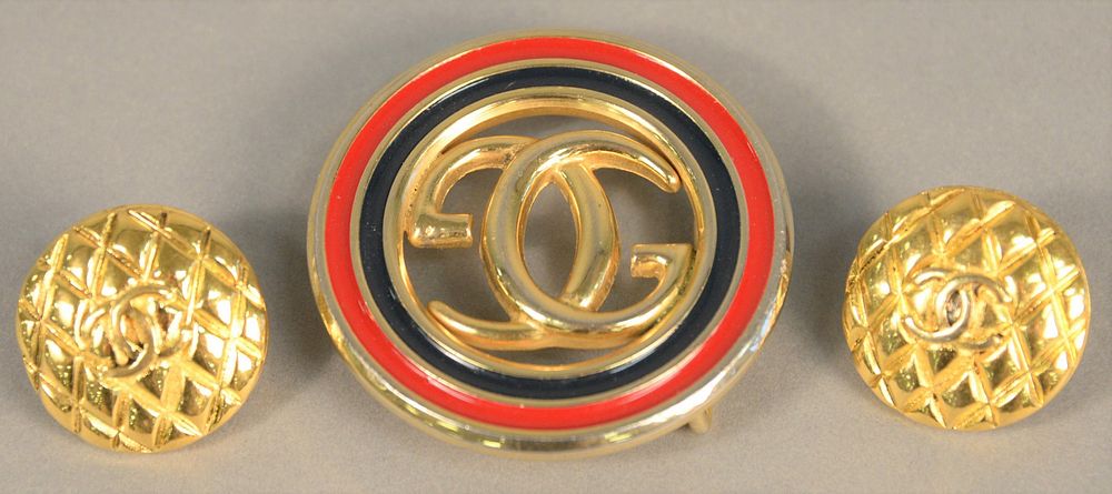 Appraisal: Three piece lot to include two Gucci belt buckles along