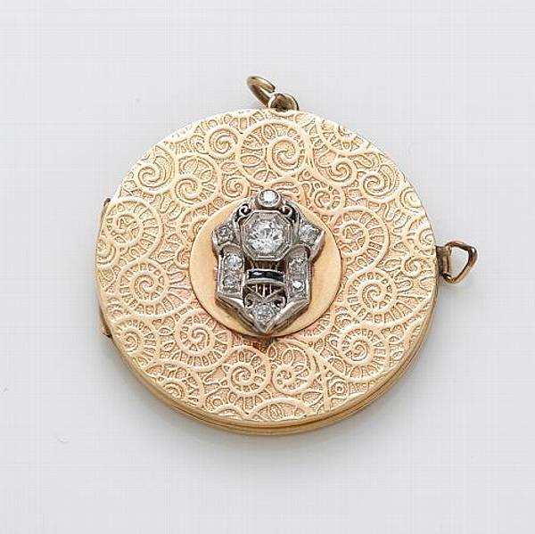 Appraisal: A diamond sapphire and k gold locket