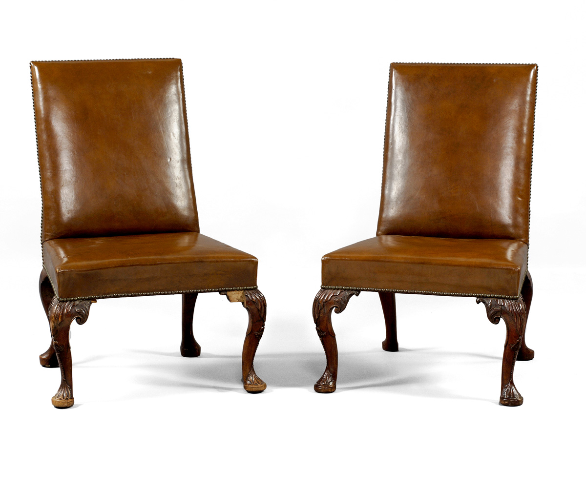 Appraisal: PAIR OF GEORGIAN CARVED MAHOGANY AND LEATHER UPHOLSTERED BACKSTOOLS