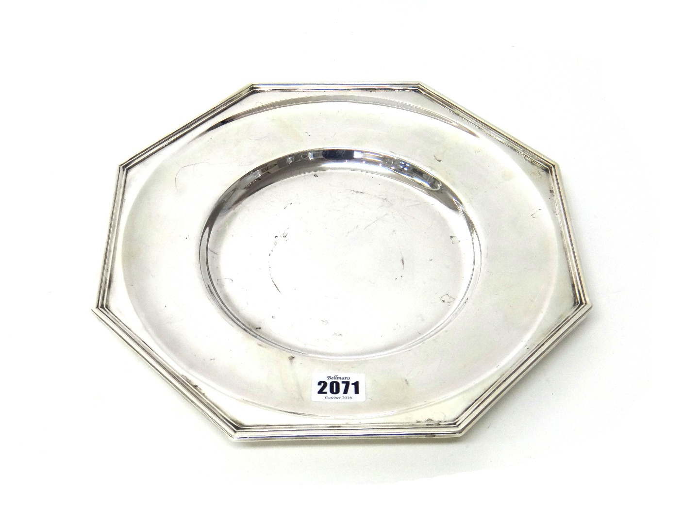 Appraisal: A silver octagonal dished plate having a reeded rim by