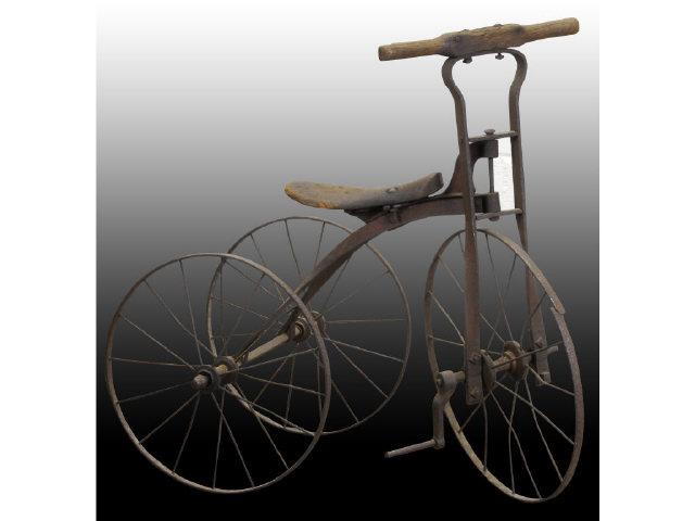 Appraisal: Wood Seated Tricycle Description Circa One pedal missing PrimitiveCondition EXCELLENT