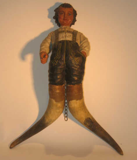 Appraisal: GERMAN CARVED WOODEN HANGING FIGURE Painted figure of a man