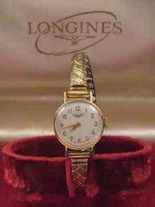 Appraisal: A ct gold Longines lady's wrist watch in fitted box