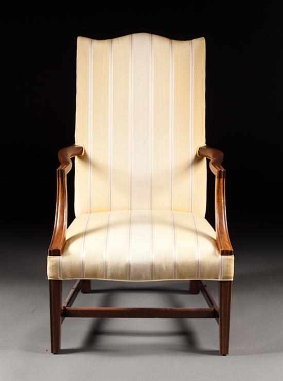 Appraisal: Federal style carved mahogany upholstered lolling chair th century in