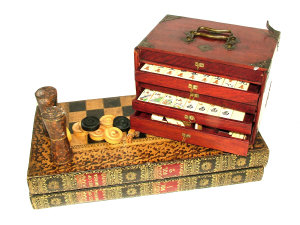 Appraisal: A tooled leather faux-book games board length cm a box