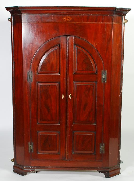 Appraisal: EARLY th CENTURY INLAID MAHOGANY LARGE CORNER CUPBOARD the cavetto