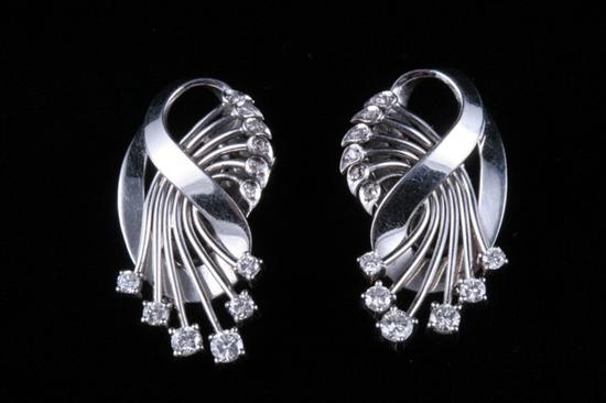 Appraisal: PAIR K WHITE GOLD AND DIAMOND LOOP-AND-SPRAY DESIGN EARRINGS Bright-polished