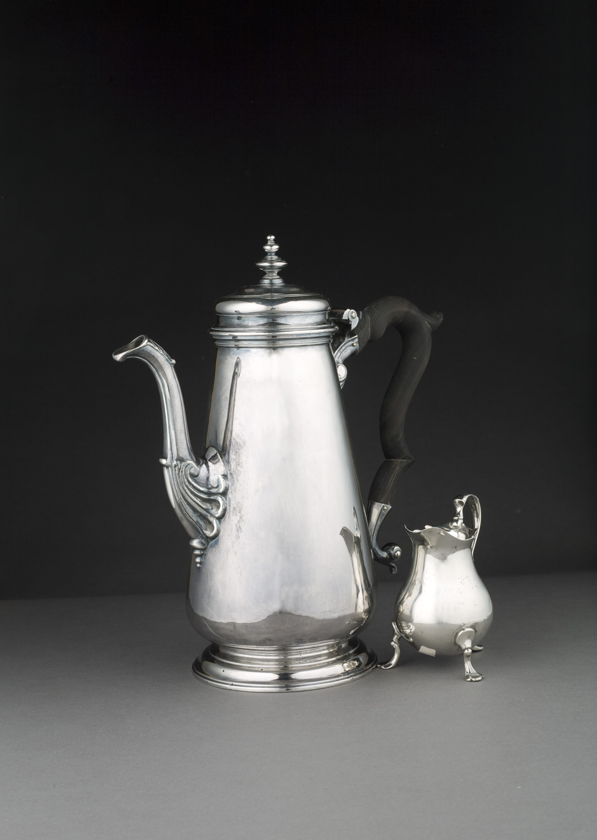 Appraisal: GEORGE II SILVER COFFEEPOT - AND A CREAM JUG -