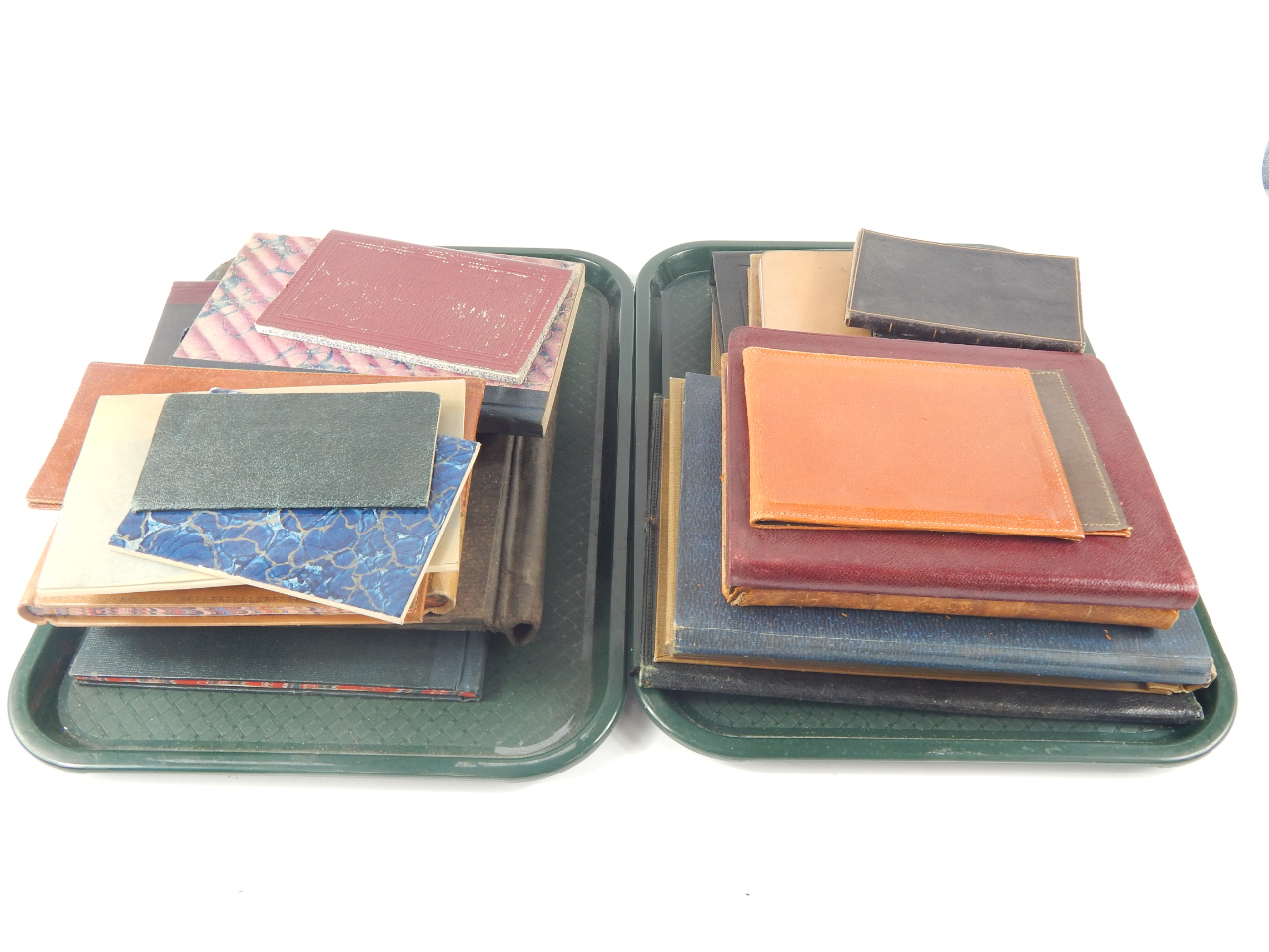 Appraisal: A collection of antque leather bound ledgers and vintage albums