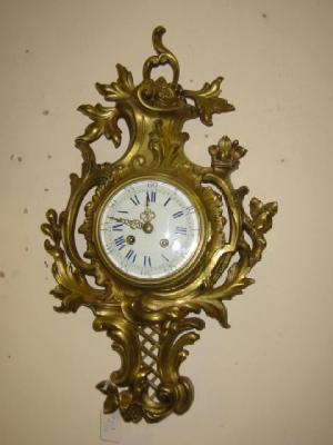 Appraisal: A LOUIS XV STYLE GILDED BRASS WALL CLOCK by Japy