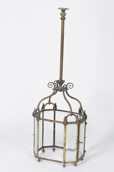 Appraisal: A GILT METAL AND GLASS HALL LANTERN with an elongated