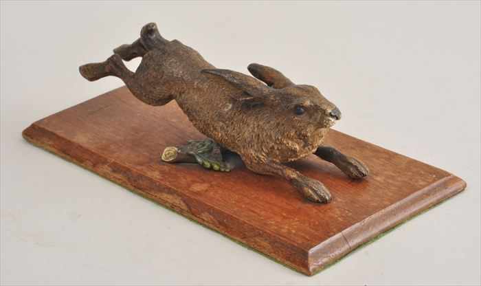 Appraisal: AUSTRIAN COLD-PAINTED BRONZE FIGURE OF A RUNNING HARE STATIONERY HOLDER