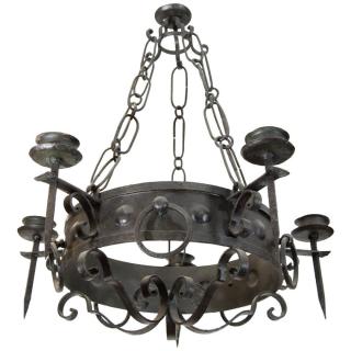 Appraisal: Spanish Neo-Gothic-style wrought iron five-light candle chandelier on a massive