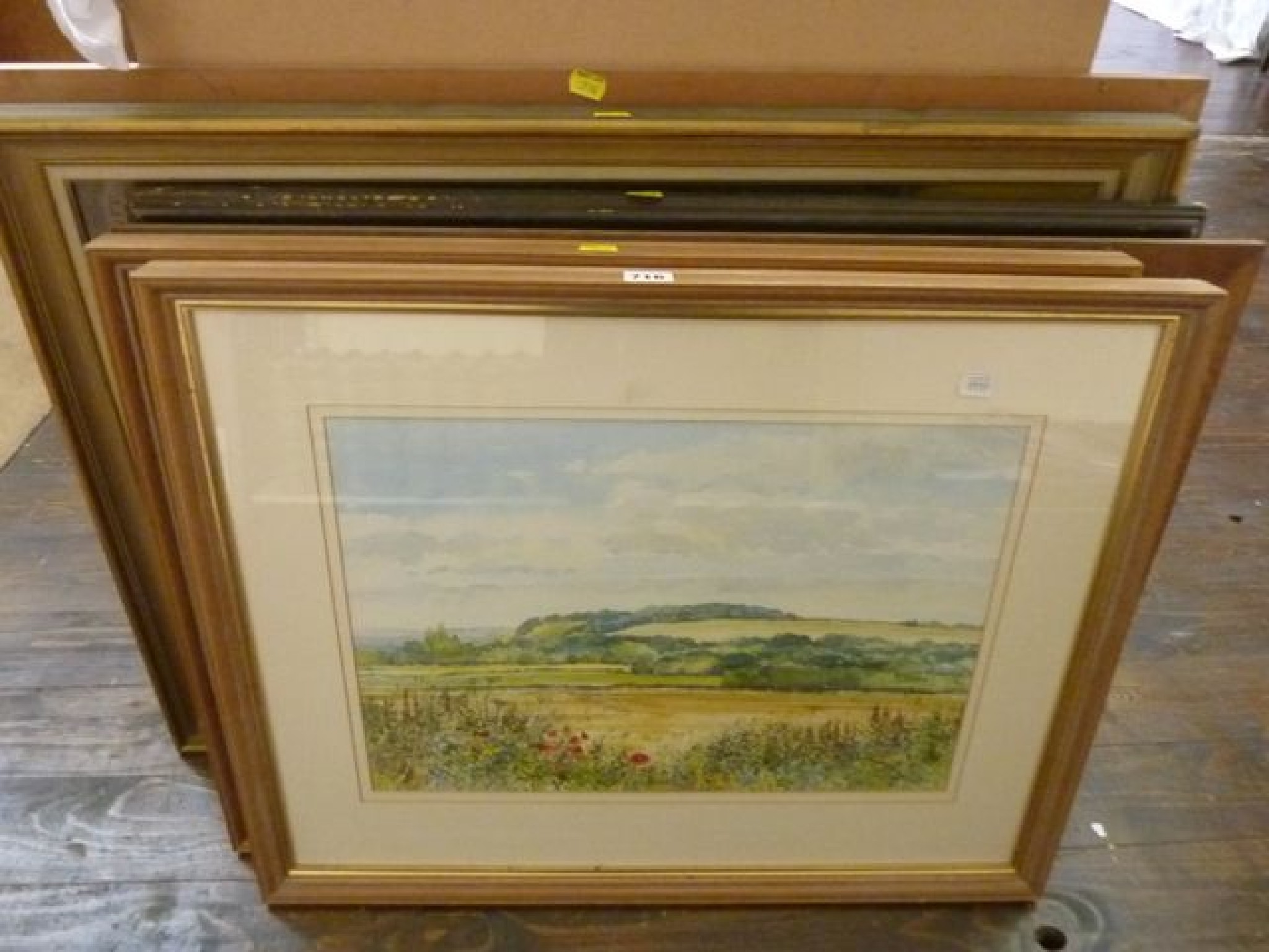 Appraisal: A pair of watercolours of country landscapes with poppies etc