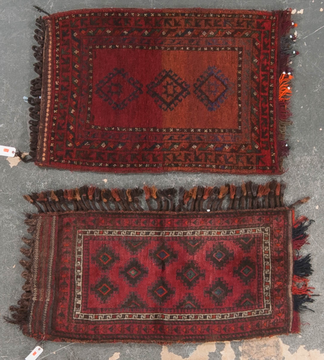 Appraisal: Two Afghani saddlebags Afghanistan circa One saddlebag is approx x