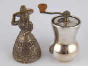 Appraisal: A silver table bell in the form of a Mexican