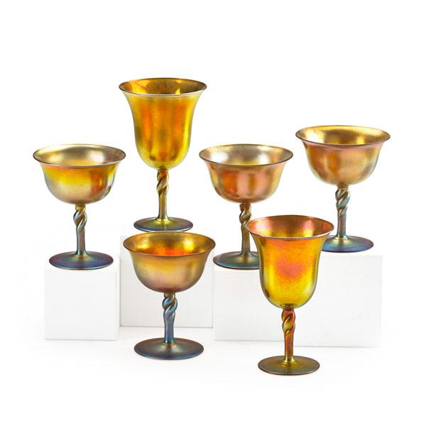 Appraisal: STEUBEN Six glass pieces comprising two iridescent wine glasses and