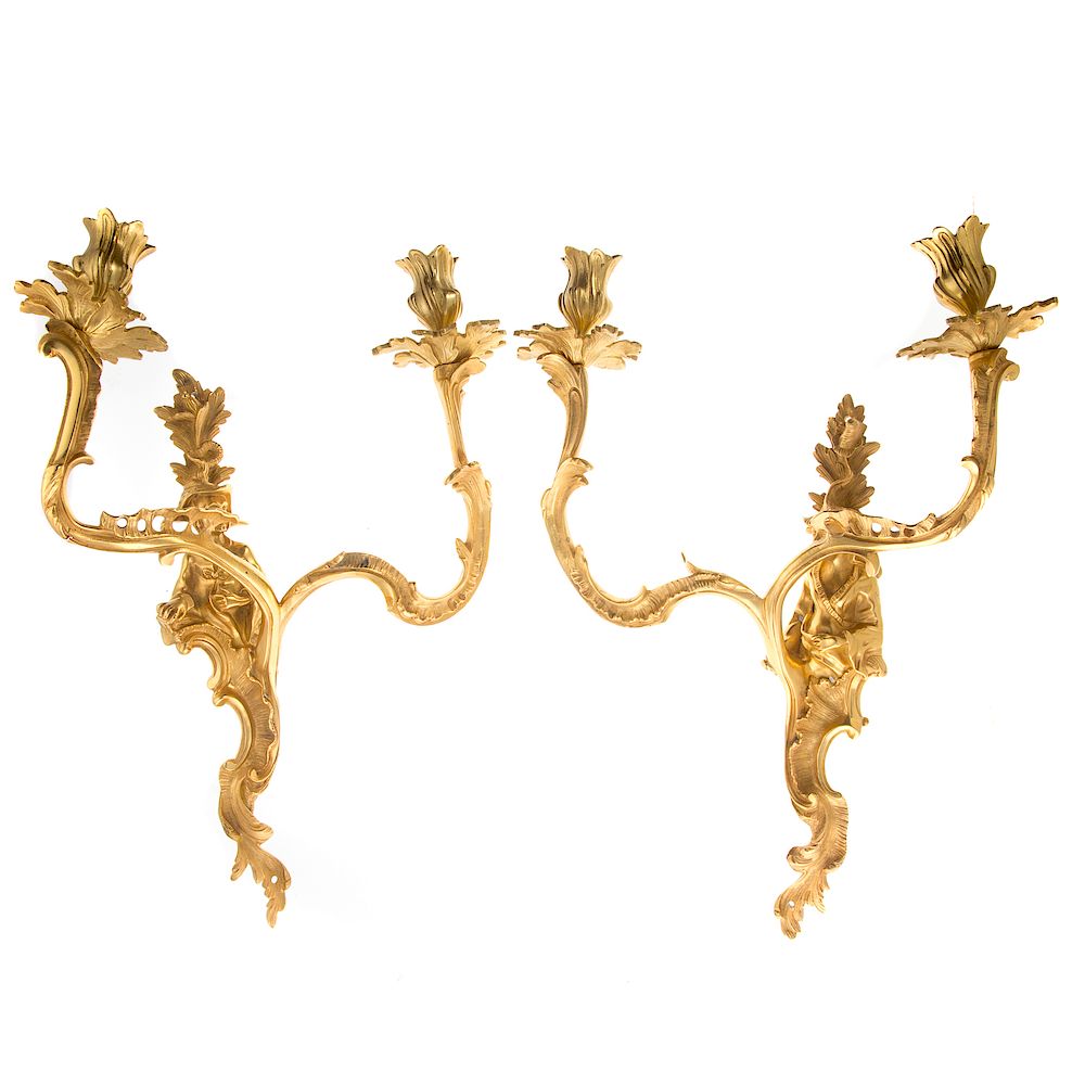 Appraisal: Pair Chinoiserie Gilt Bronze Sconces early th century individually modeled