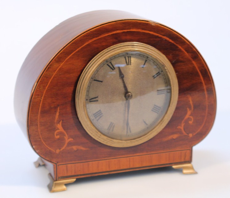 Appraisal: An Edwardian and mahogany and boxwood strung mantel clock with