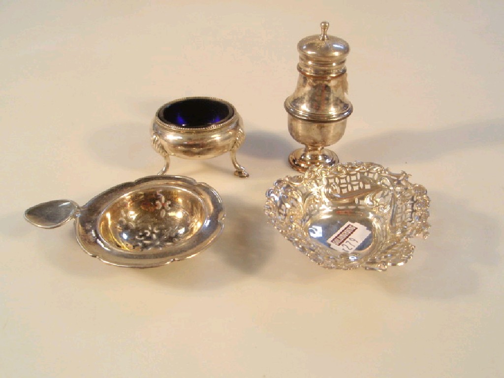 Appraisal: A Victorian silver salt with blue glass liner on three