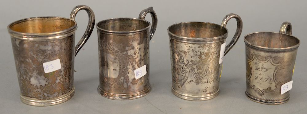 Appraisal: Four various N Harding Boston coin silver cups with handles