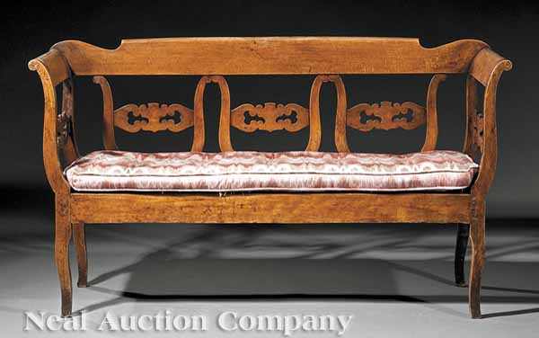 Appraisal: An Antique Provincial Walnut Settee th c shaped crest rail