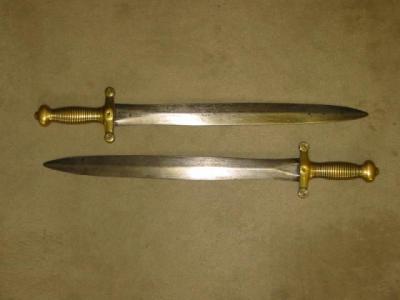 Appraisal: A PAIR OF FRENCH ARTILLERY SWORDS pattern with brass hilt