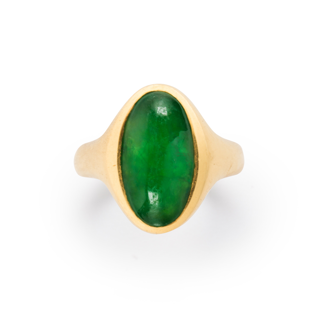 Appraisal: A JADE AND TWENTY-TWO KARAT GOLD RING A jade and