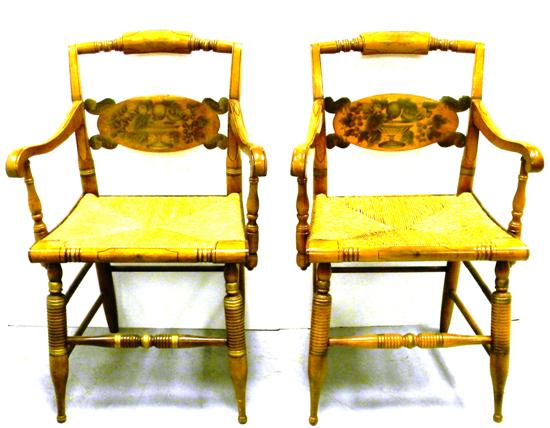 Appraisal: A pair of Hitchcock armchairs blonde finish with stenciled decoration