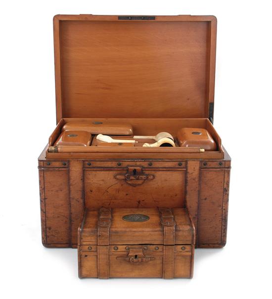 Appraisal: Edwardian carved mahogany humidor smoking set circa finely carved strap-design