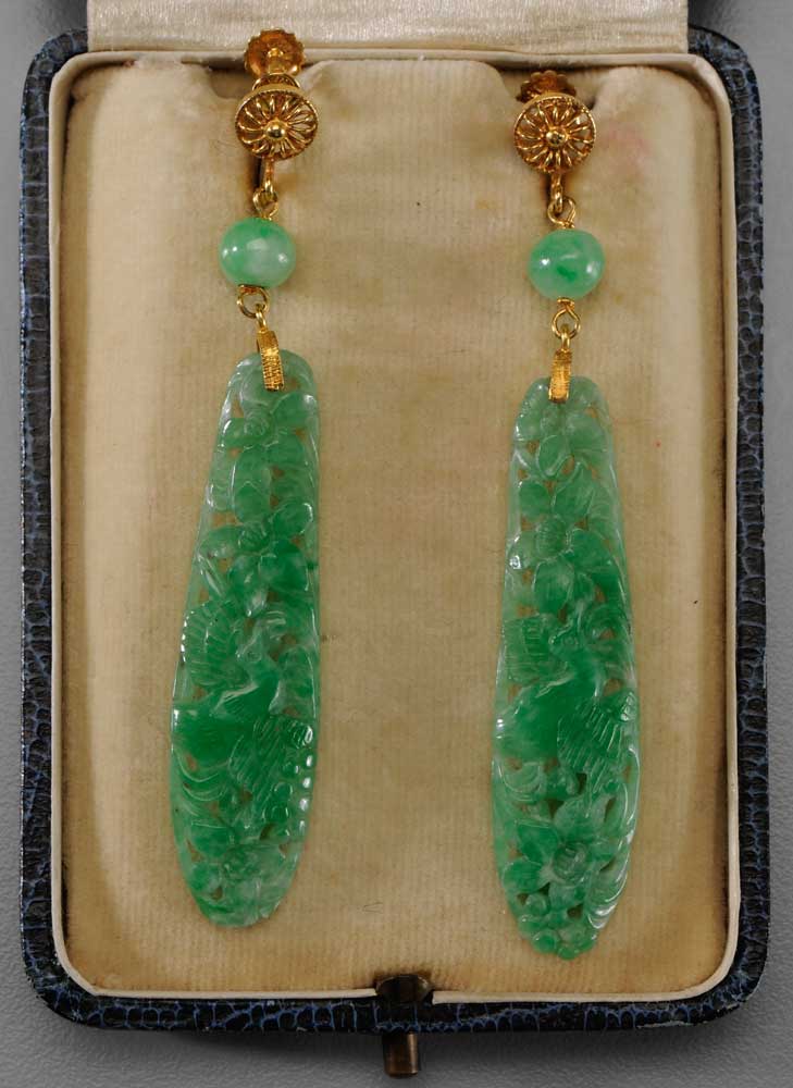 Appraisal: Jade Earrings Chinese apple green with white inclusions openwork ovals