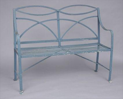 Appraisal: ENGLISH BLUE PAINTED CAST-IRON GARDEN SEAT The figure top-rail above