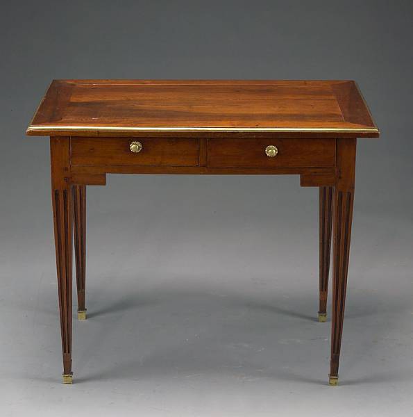 Appraisal: A Directoire brass mounted fruitwood writing table first quarter th