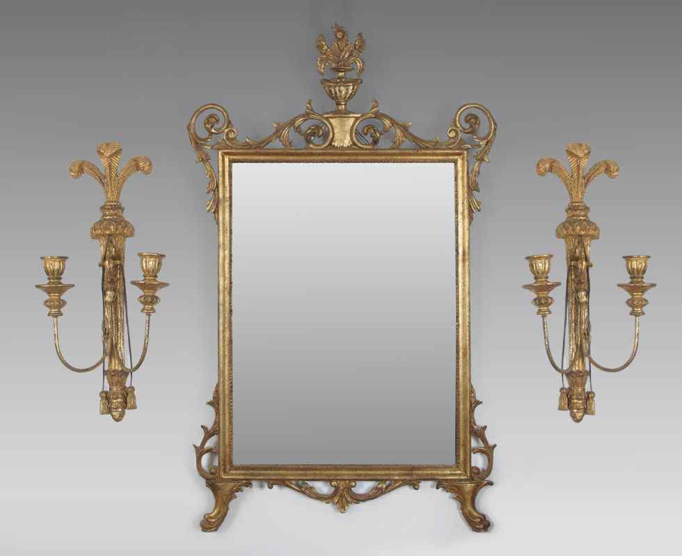 Appraisal: CARVED AND GILT WOOD MIRROR SCONCES Mirror surmounted by carved