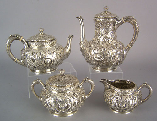 Appraisal: Sterling silver four piece repousse tea service late th c