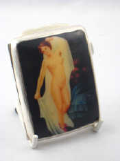 Appraisal: A silver curved cigarette case the lid with a printed