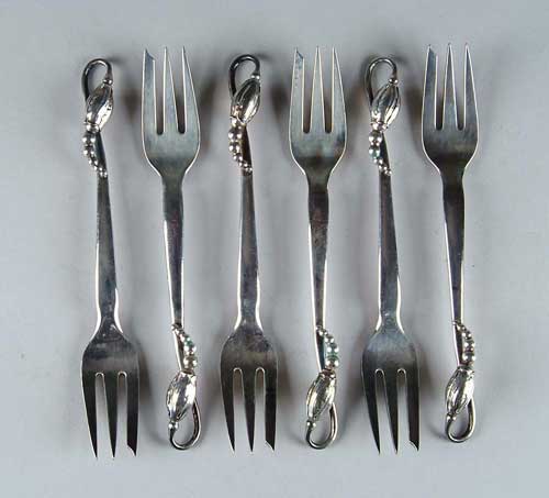 Appraisal: SET OF TWELVE GEORGE JENSEN OYSTER FORKS IN THE BLOSSOM