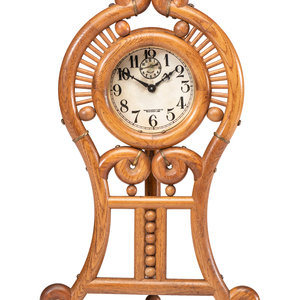 Appraisal: A Stick and Ball Oak Mantel Clock with New Haven