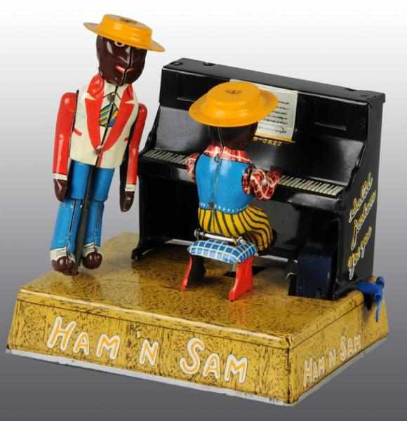 Appraisal: Tin Linemar Ham N Sam Band Wind-Up Toy Description Japanese