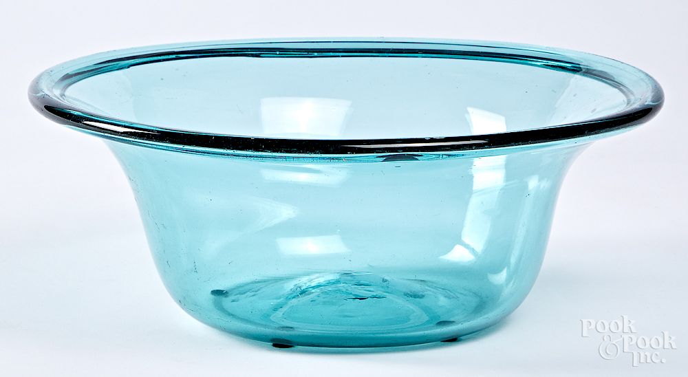 Appraisal: Large free blown aquamarine glass bowl Large free blown aquamarine