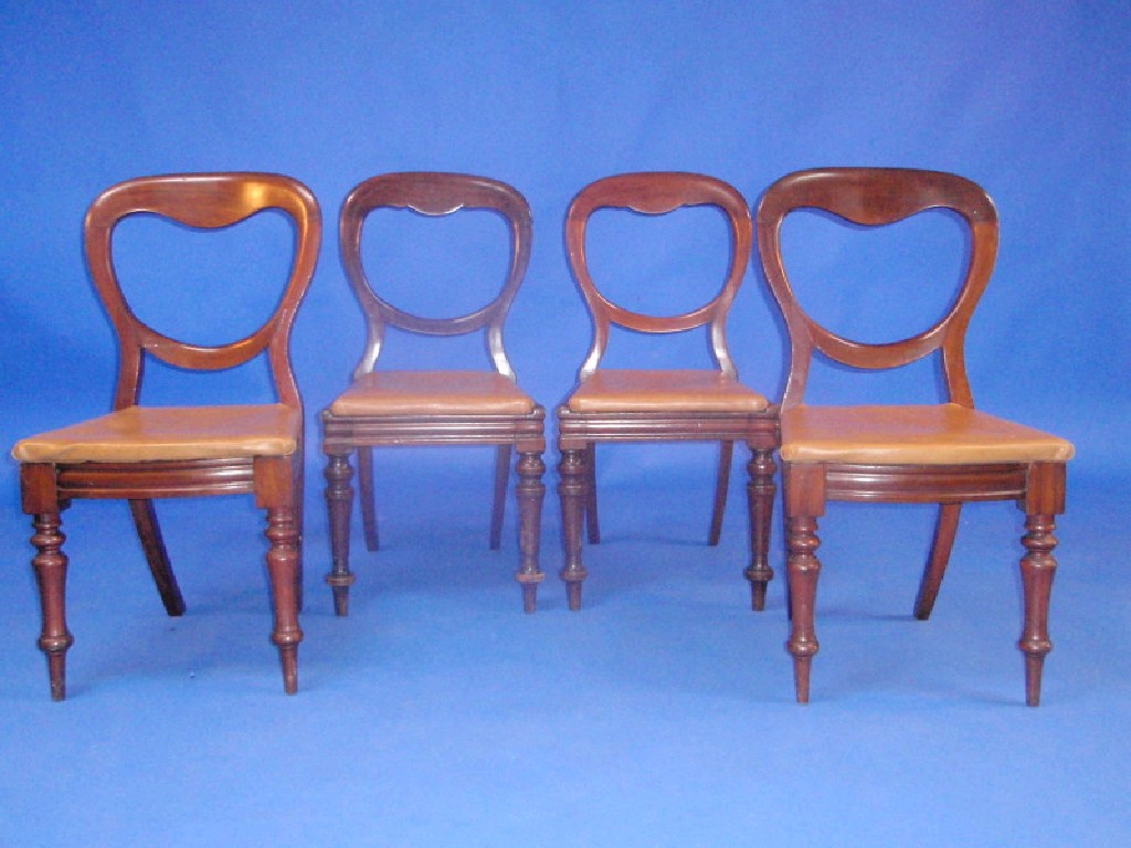 Appraisal: A set of four Victorian mahogany balloon back dining chairs