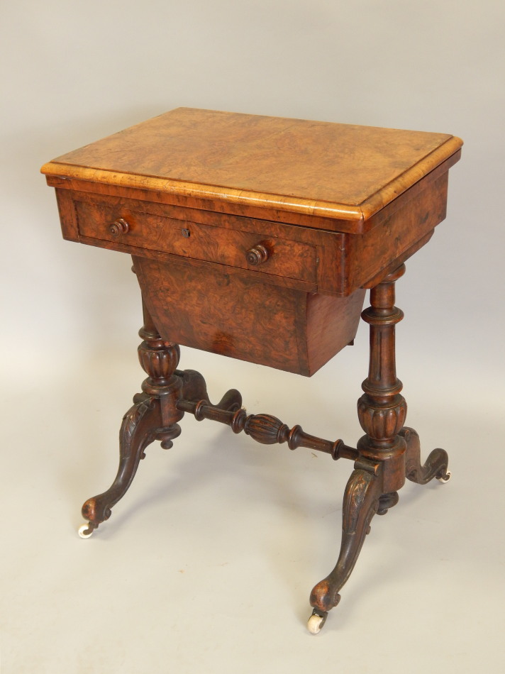 Appraisal: A Victorian burr walnut games work table the rectangular quarter