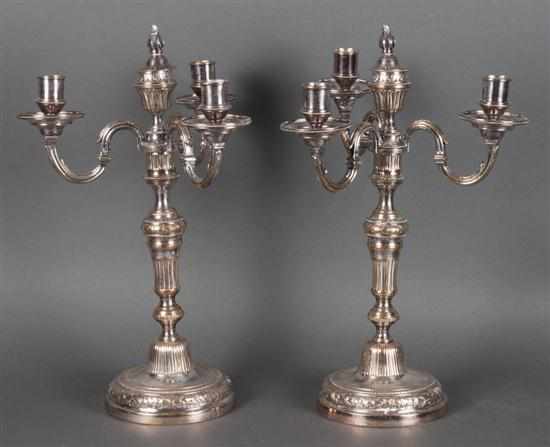 Appraisal: Pair of Continental neoclassical style silver-plated brass four-light candelabra th