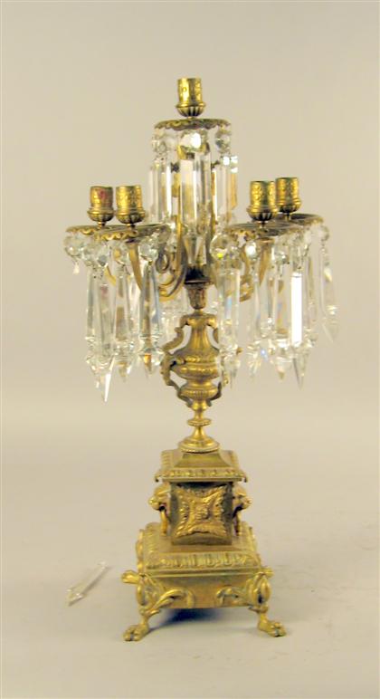 Appraisal: Louis XIV style gilt metal candelabrum The central urn issuing